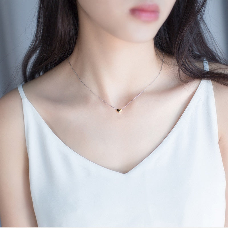 Collar de Plata con Colgante de Corazón Dorado