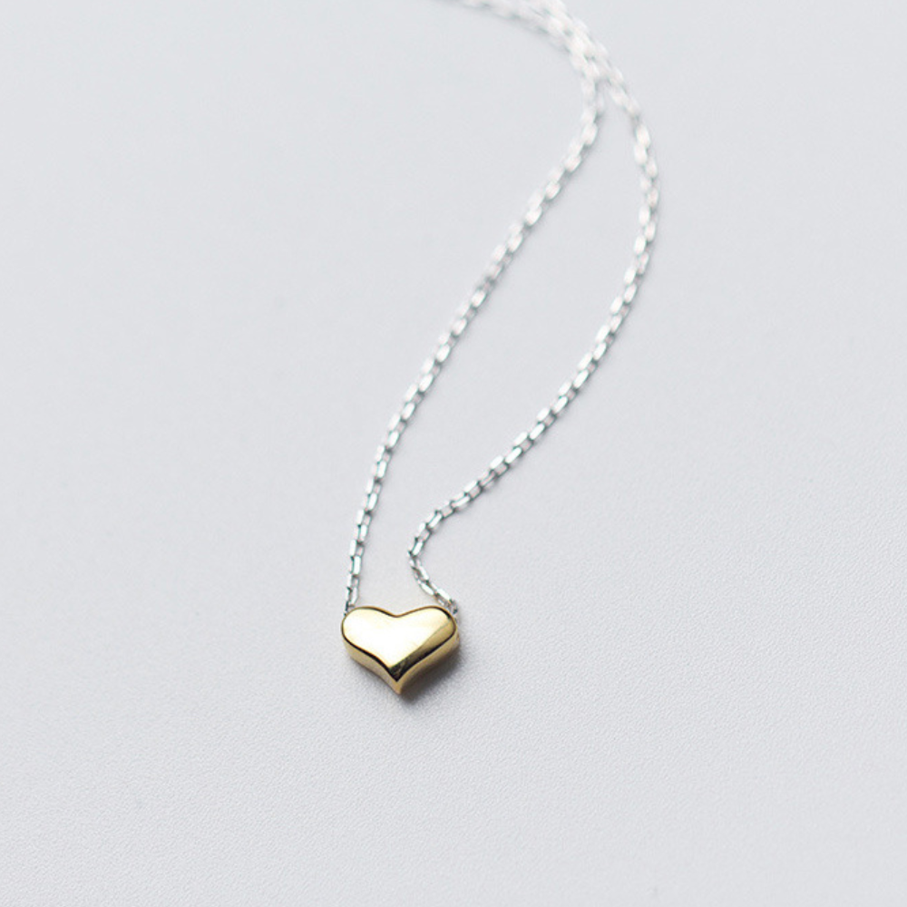 Collar de Plata con Colgante de Corazón Dorado